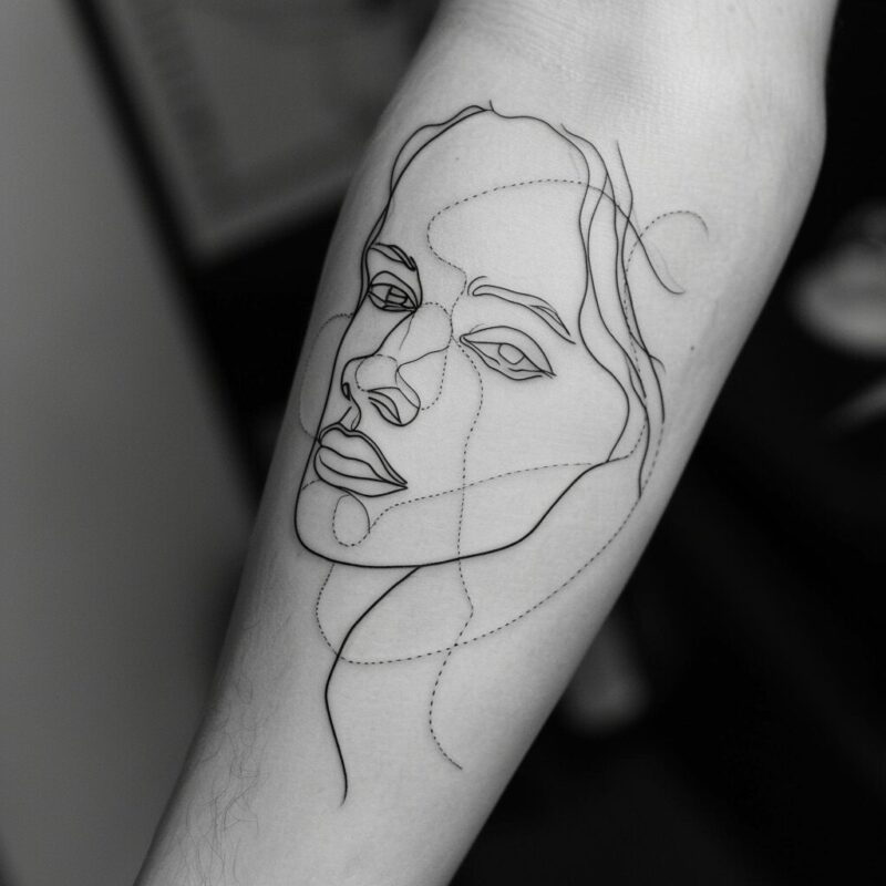 Line tattoo on arm